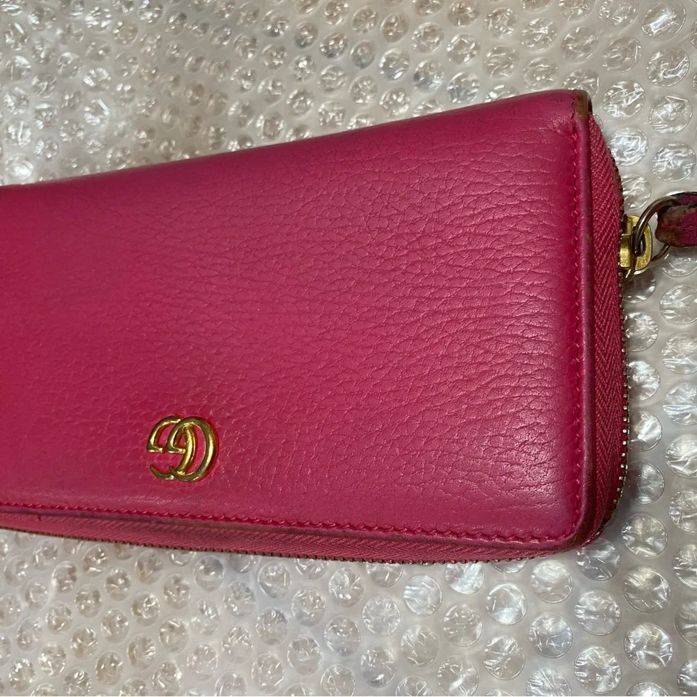 Gucci GG Marmont zip-around wallet in shocking pink
